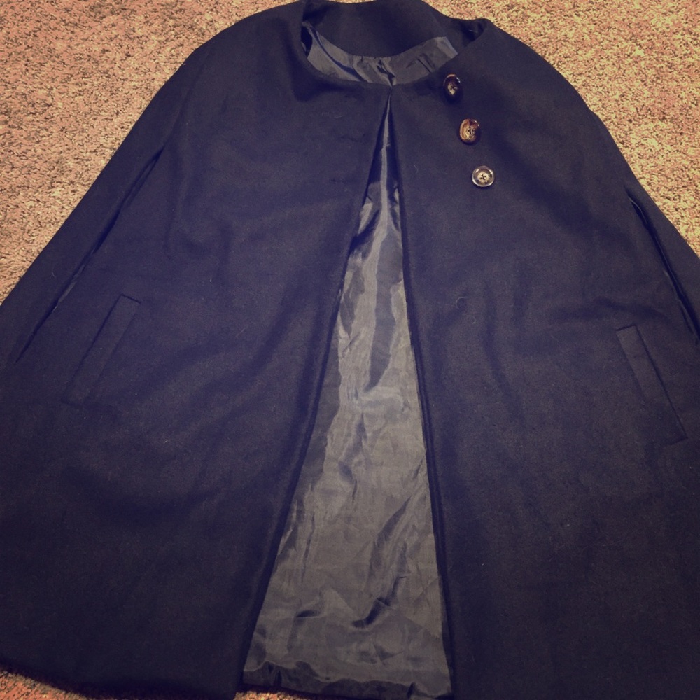 Black cape with button closure